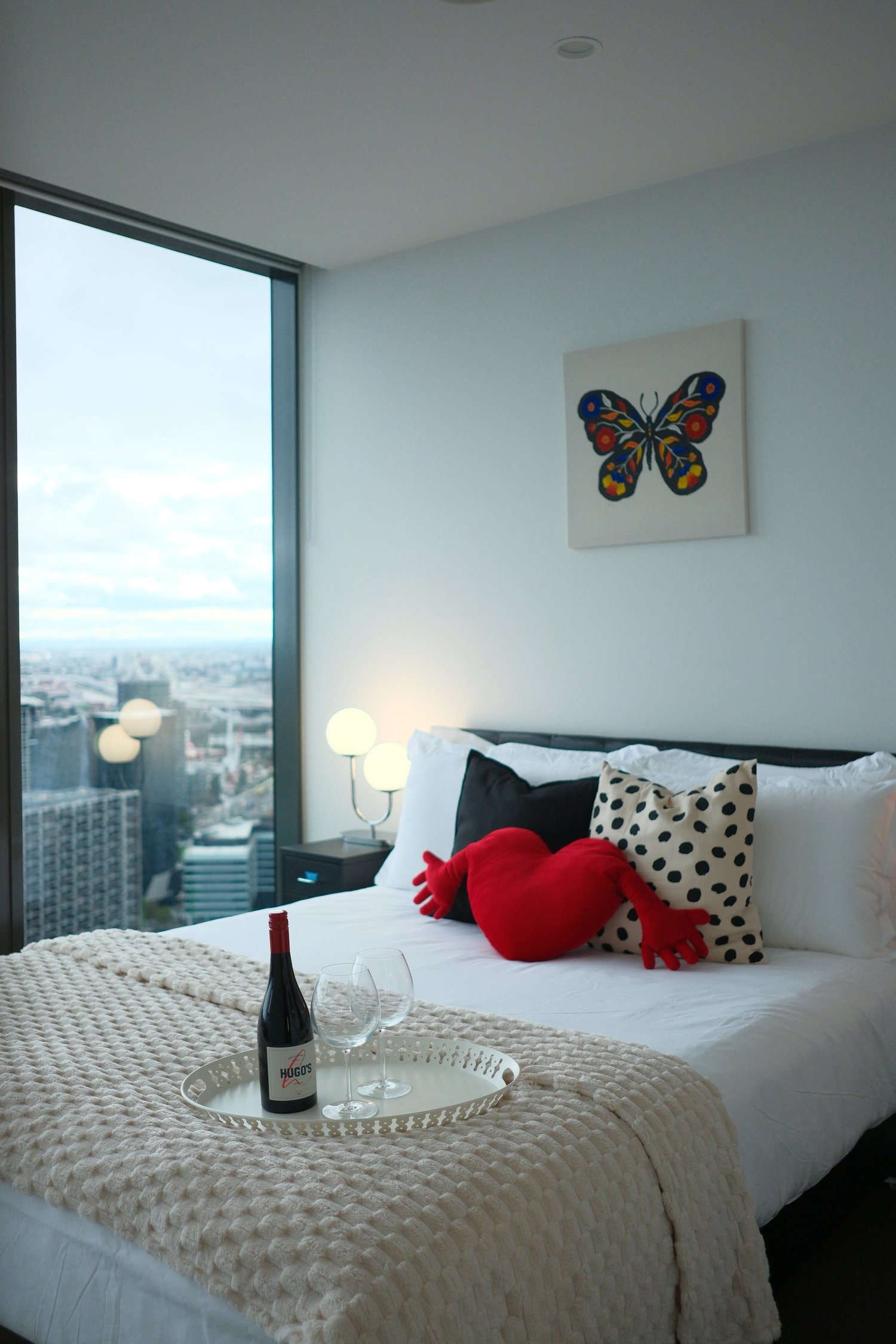 Prepared apartment bedroom with Melbourne city views